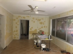 A room with walls and ceiling painted yellow.